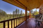 Arrow Lodge -  Deck view of log cabin. 